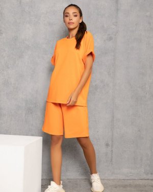 Трикотажний помаранчевий костюм з шортами - 8542082 - SvitStyle