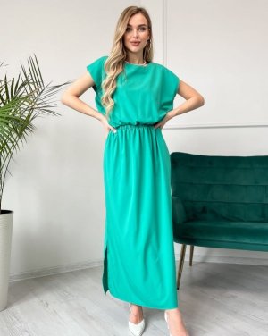 Зелена однотонна сукня з боковим розрізом - 8542558 - SvitStyle