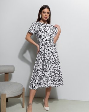 Чорно-біла приталена сукня з принтом - SvitStyle