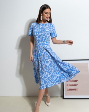 Блакитна приталена сукня з принтом - SvitStyle