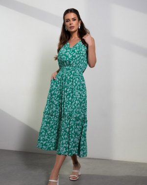 Зелена квіткова сукня з рюшами та воланом - SvitStyle