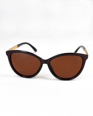 Коричневі сонцезахисні окуляри із золотими вставками - SvitStyle